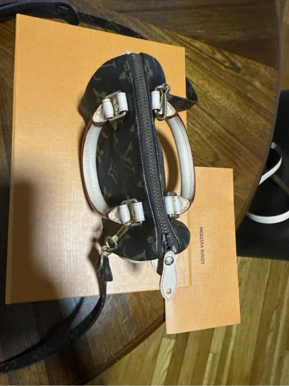 Louis Vuitton Monogram Mini Speedy Bandoulière in Brown with Natural Vachetta